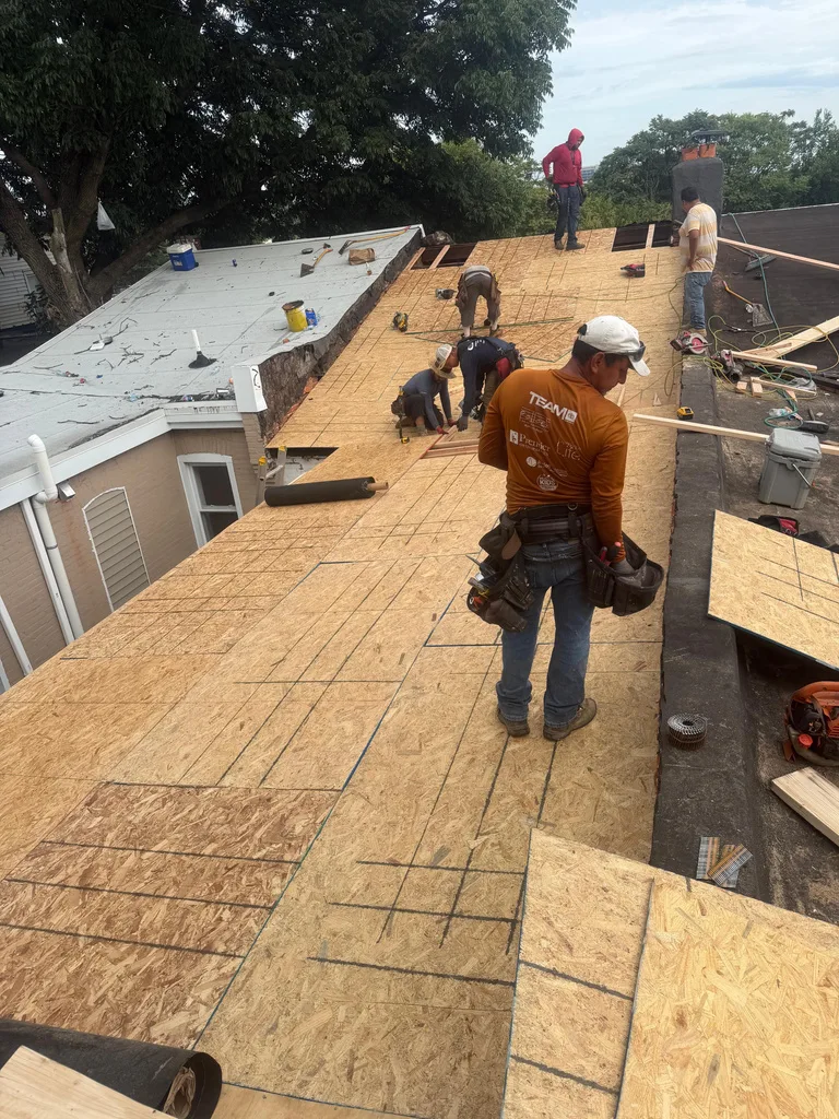 CP Roofing crew preparing roof decking
